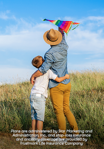 Member with dependent at beach with kite. Small Business Benefits member login